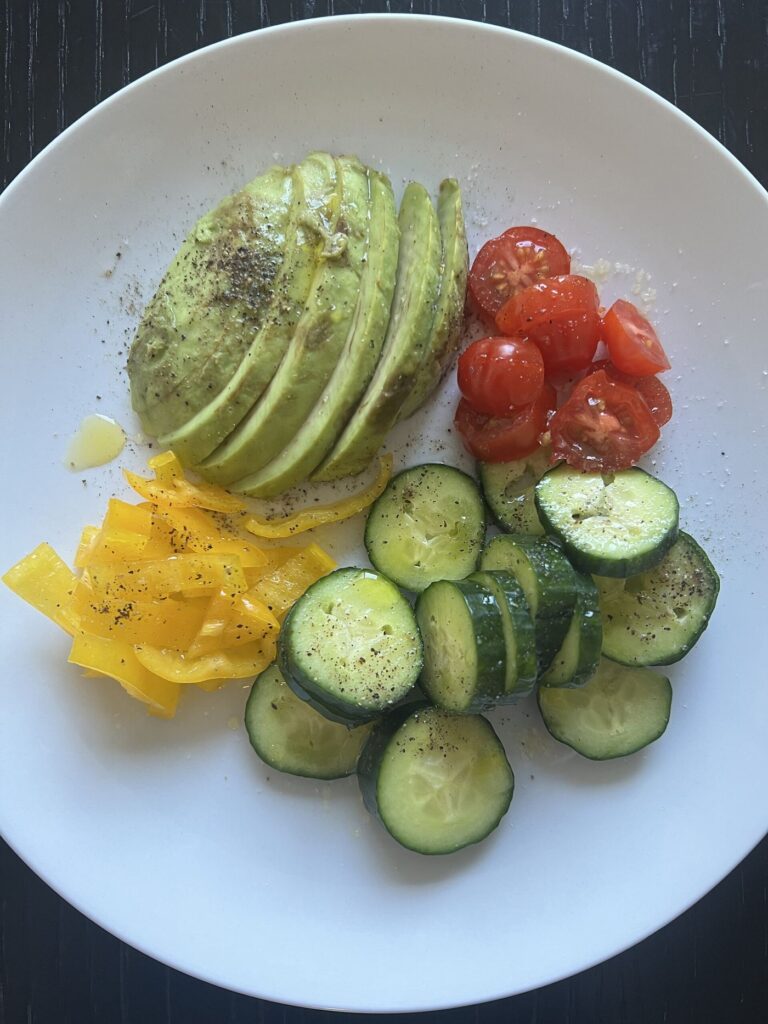 bowl of fresh vegetables with olive oil